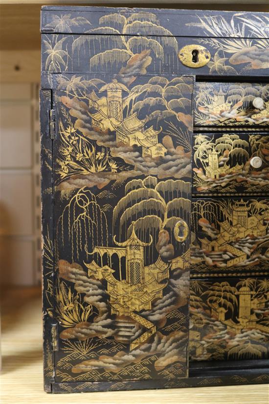 A Regency Japanned chinoiserie cabinet